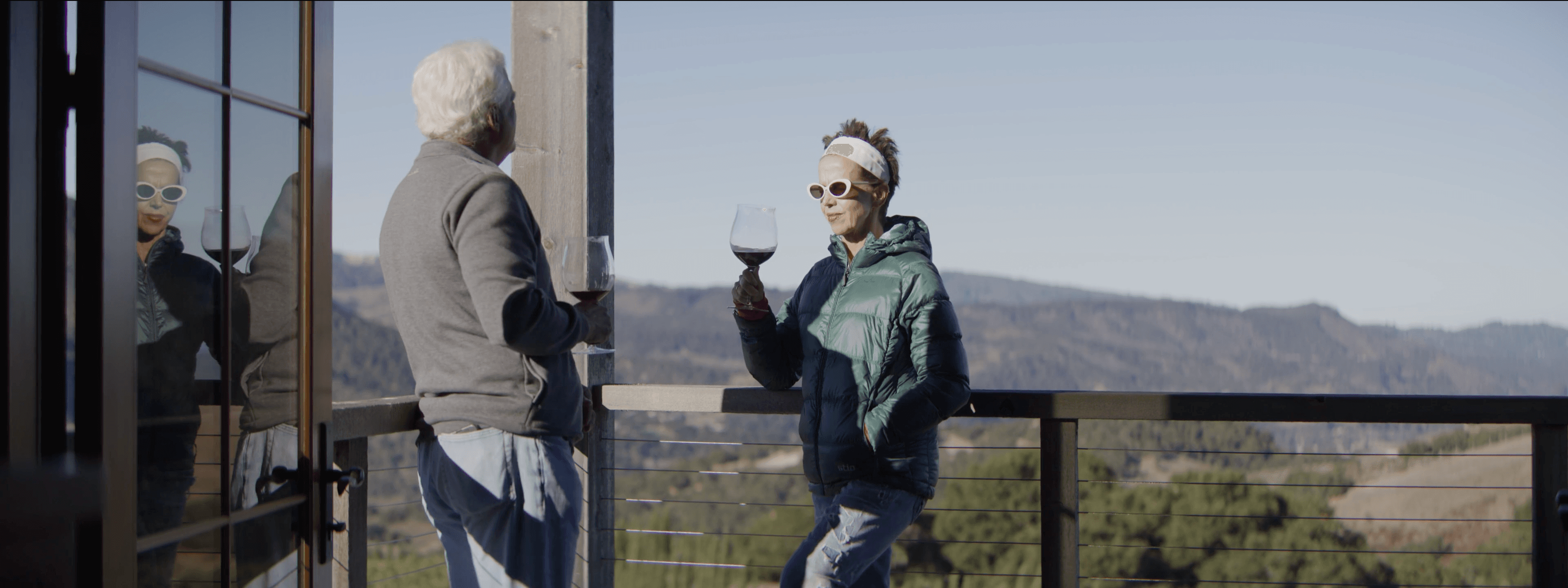 Andy and Margaret Paul toasting wine together